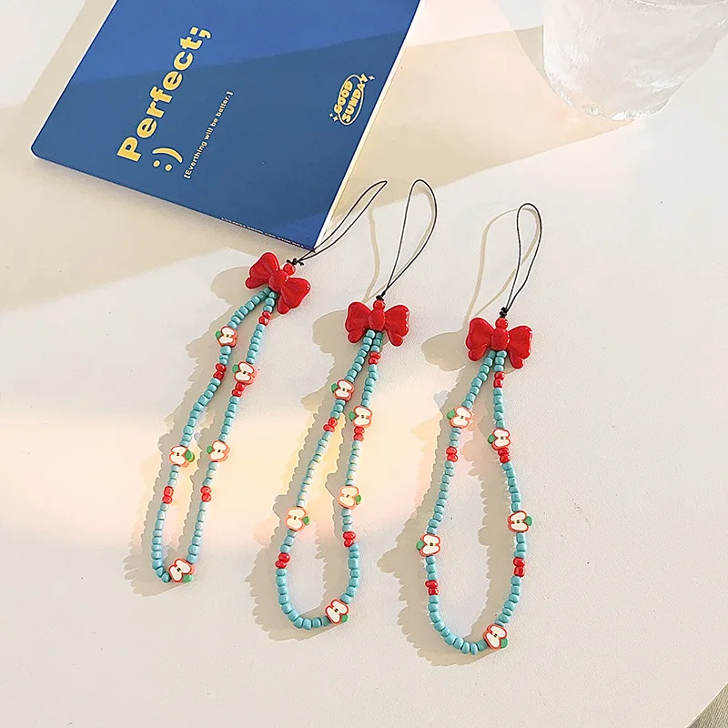 

Sweet Princess Fashion Short Phone Charm Creative Design Red Apple Bow Phone Lanyard Universal Kawaii Phone Camera Pendant