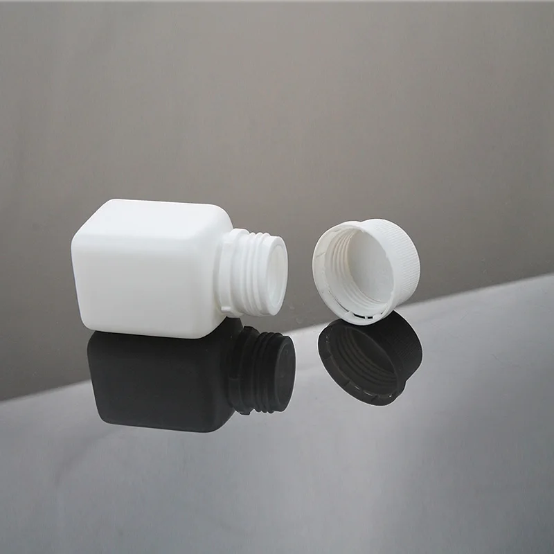 50/100pcs Empty 30cc 30ml White HDPE Square Shape Potable Plastic Vitamin Pill Bottles with Tamper Proof Caps Lids for Medicine