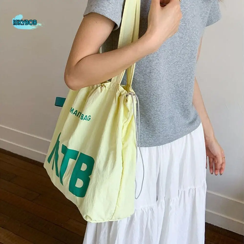 

Simple Solid Color Drawstring Bags Nylon Light Weight Letter Shoulder Bag Shopping Large Capacity Tote Bags Summer