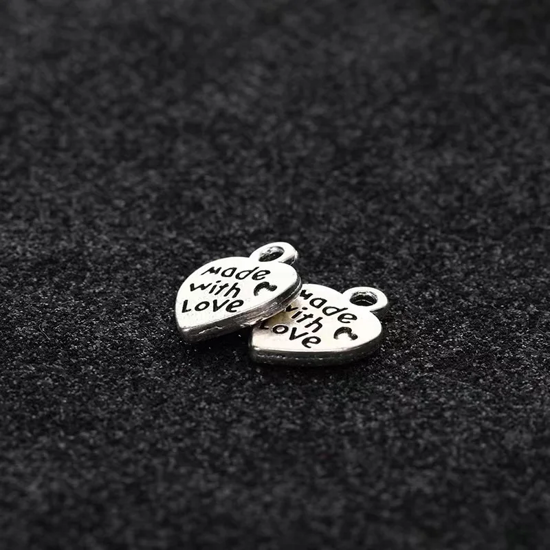 Elegant and niche retro alloy heart-shaped pendants, DIY fashion clothing accessories and antique silver and gold