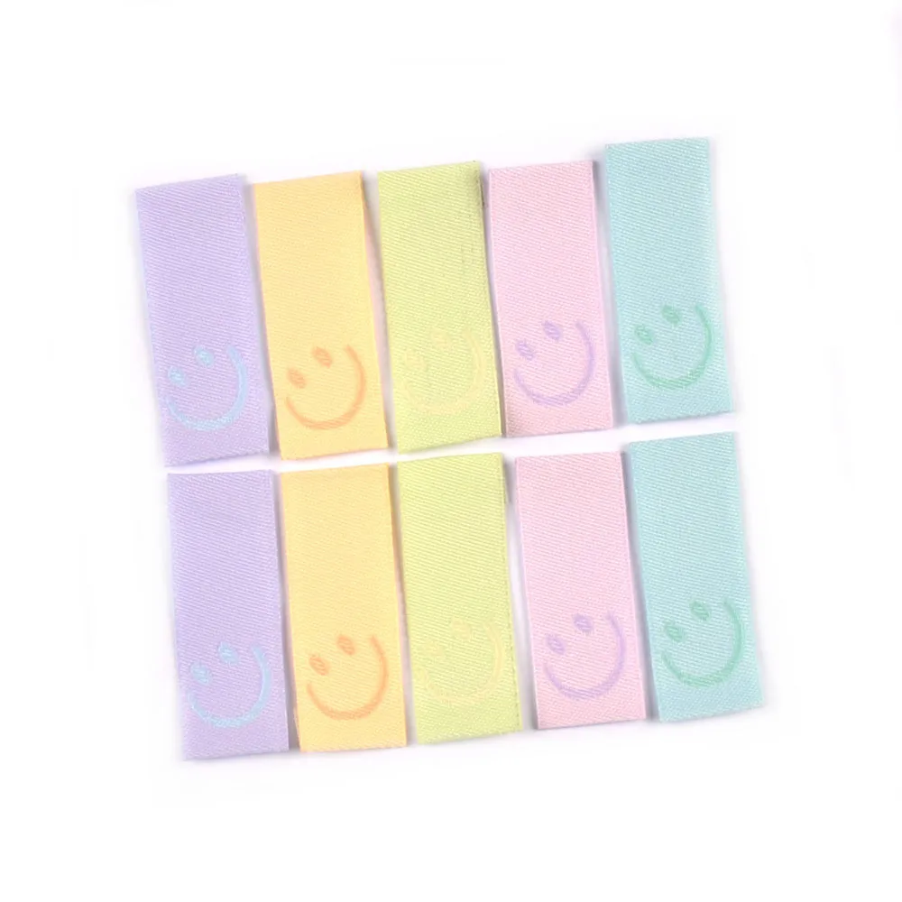 50Pcs New Candy Color Embroidery Smile Labels For Sewing Accessories Clothes Washable Care Garment Bags Tags DIY Supplies c3513