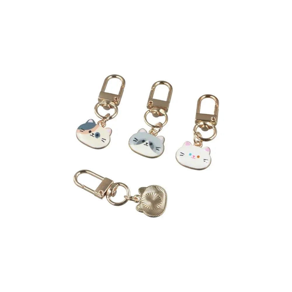 Wykwintnie wykonany metalowy breloczek z emalią w kształcie kotka, mały brelok do kluczy, zawieszka do torby, słodki breloczek z kreskówki.
