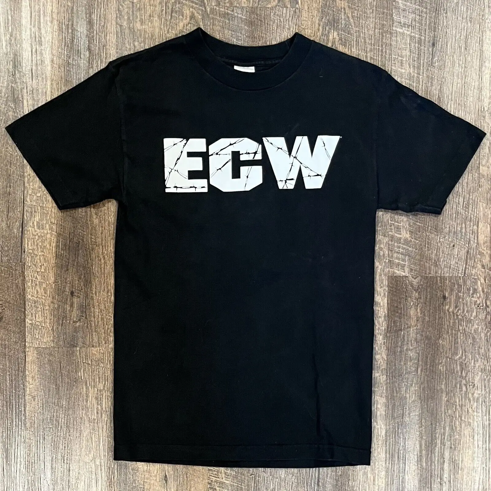 VTG เสื้อผ้ามวยปล้ำ ECW สไตล์วินเทจ AAA เสื้อยืดแซนด์แมนแจ็คแคคตัสใหม่