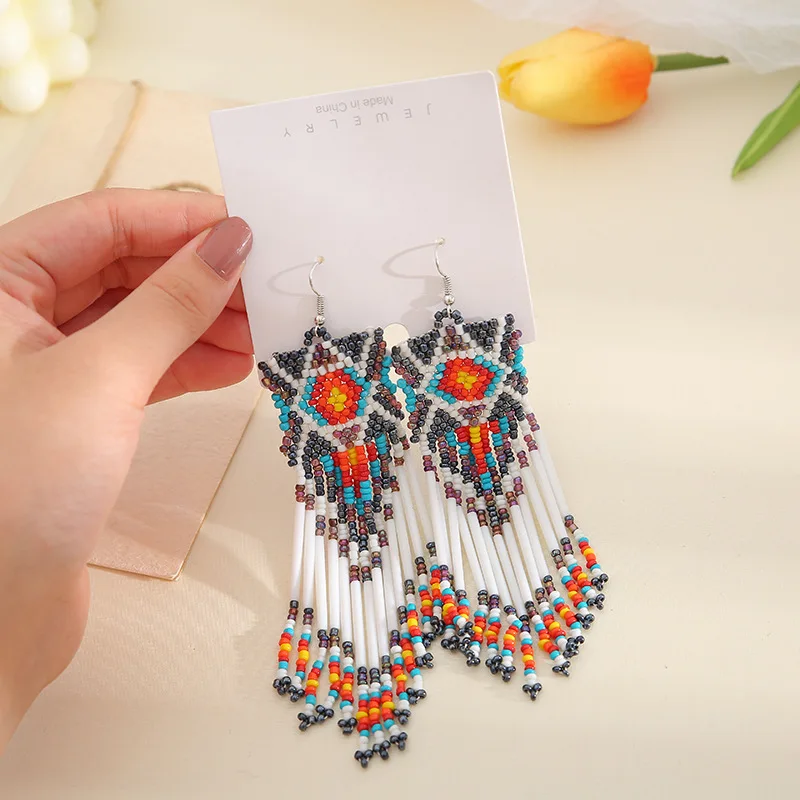 Rice bead earrings  Hand woven  fashion  graphical  Long tube  Beading  Simplicity  Bohemia  alloy  ma'am  Fringed earrings