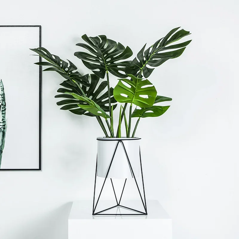 Modern Geometric Iron Plant Holder Sleek Black and White Hollow Pot Stands for Contemporary Indoor and Outdoor Botanical Display