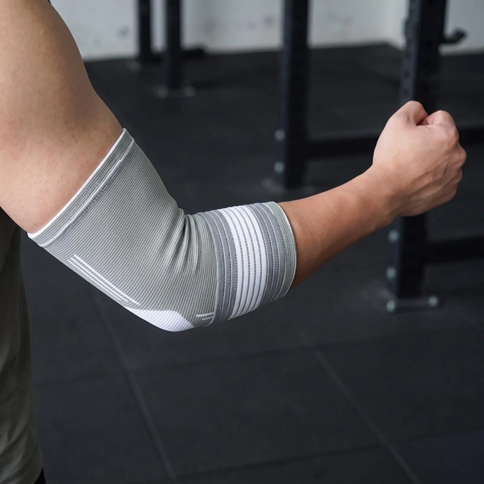 3D Knitted Elbow Brace with Circumferential Strap for Secure Fit in Workout and Daily Exercise