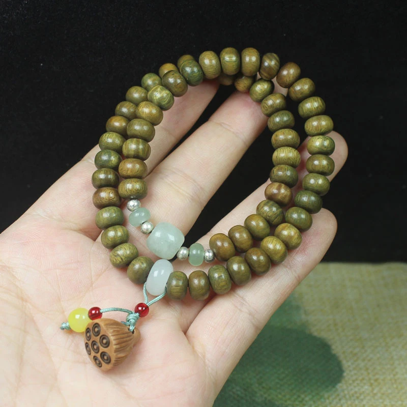 

Браслет из бусин из зеленого сандалового дерева 8 мм, двухслойный дизайн с подвеской в виде лотоса, унисекс, молитвенные четки и декоративный предмет.