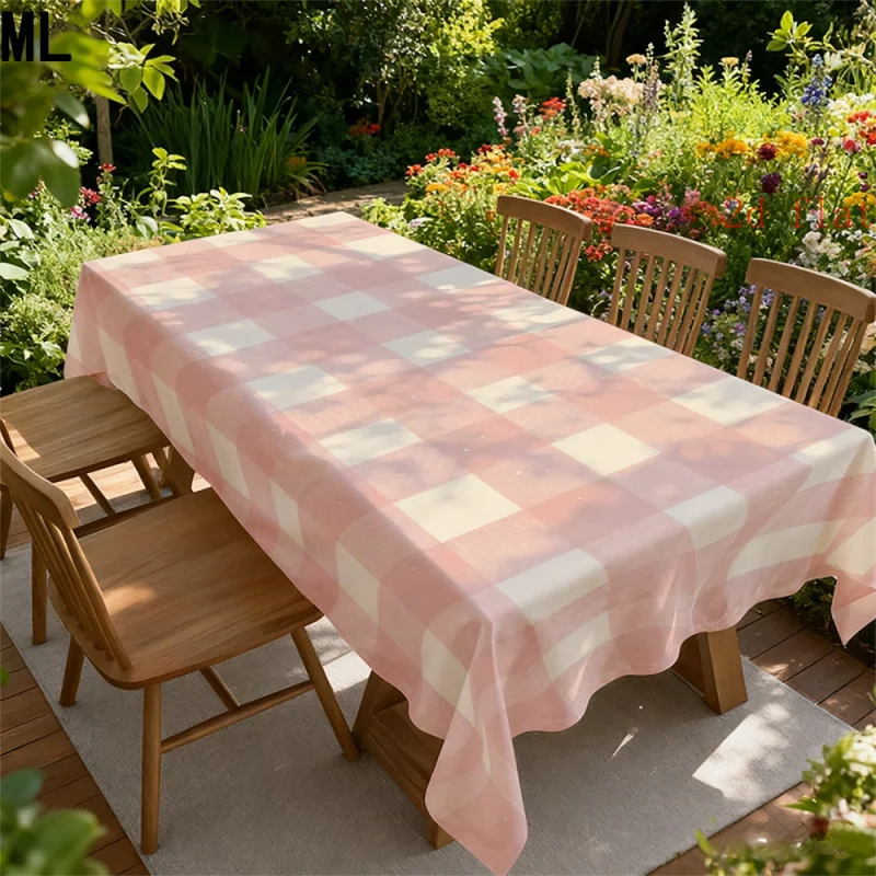 One piece of powder-white checkered tablecloth, suitable for the dining table. A rectangular machine-washable table cover.