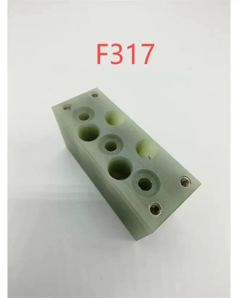 

F317 A290-8110-X600 Upper lsolator Plate 27L*70W*35H for wire machines