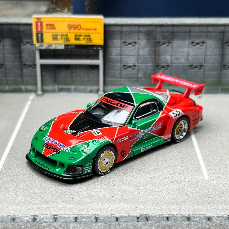 

In stock: 1:64 #990 Mazda RX7 787B 55 die-cast simulation alloy car model, boy gift toy, adult collectible display item.