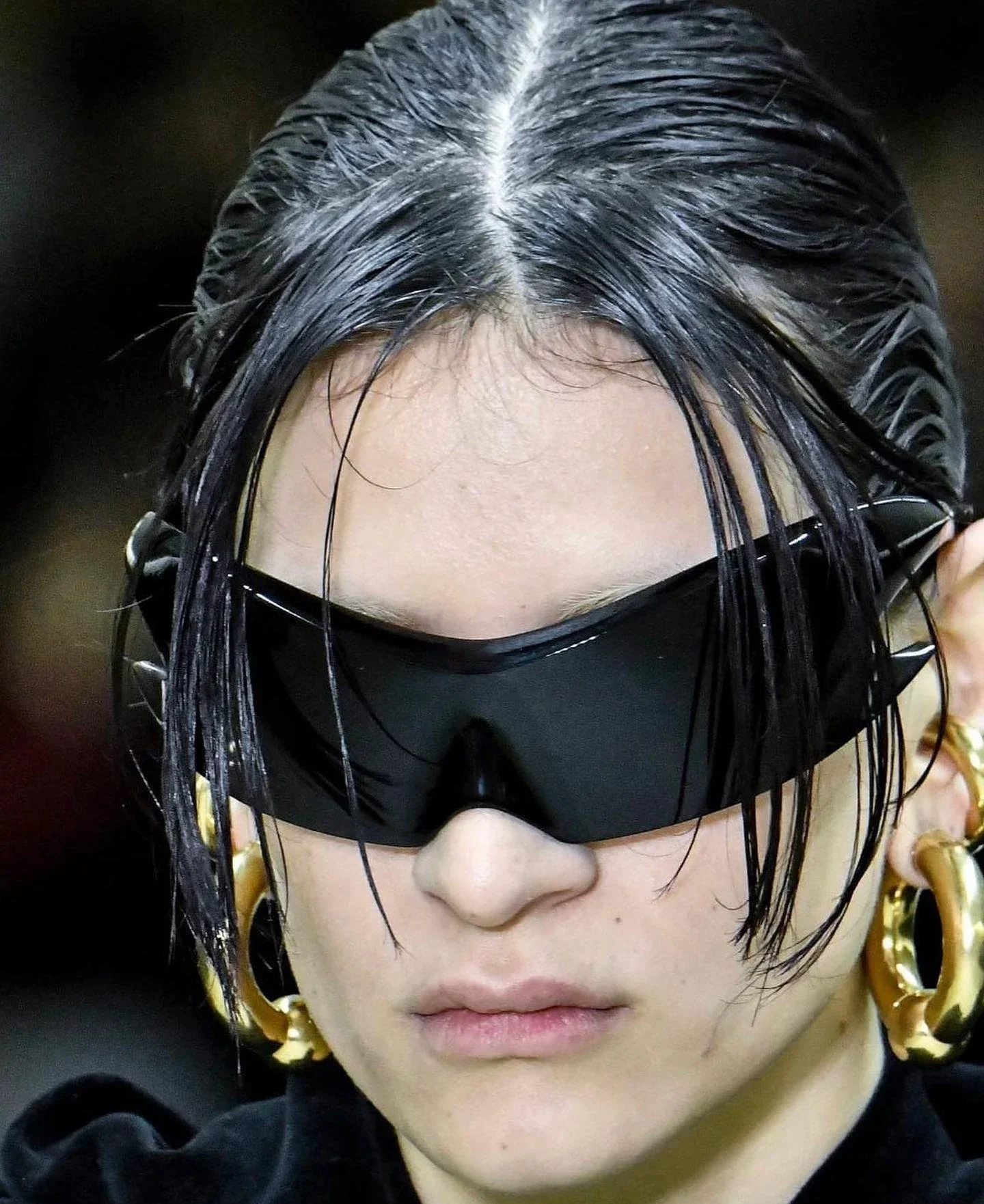 Avant-garde, fashionable, retro, and shapely connected sunglasses with a futuristic style and a wasteland era design. Sunglasses