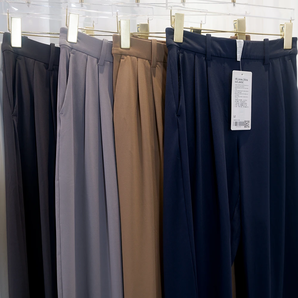 Hosen mit Taschen und Falten, angenehm kühlend, vielseitig einsetzbar, weit geschnitten, lange Hose, lässig, gerade geschnitten, mit elastischem Bund. – Detail 7