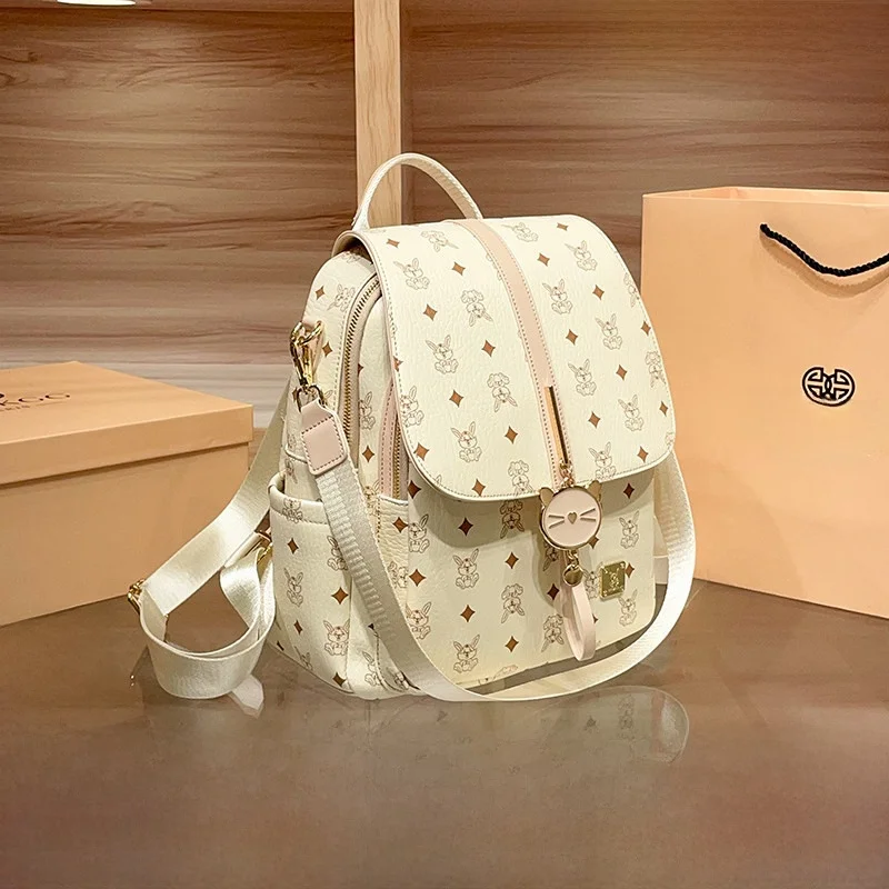 sac-a-dos-de-voyage-pour-femme-en-cuir-de-marque-hongkongaise-grande-capacite-leger-et-tendance-nouveau-style-2026-decontracte-et-simple