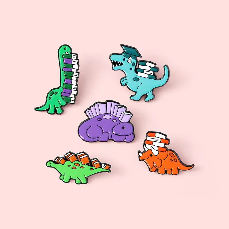 Dinosaur and Books Enamel Pins Custom Reading Habit Animal Brooch Clothes Lapel Badges Cartoon Jewelry Gift for Friend Wholesale