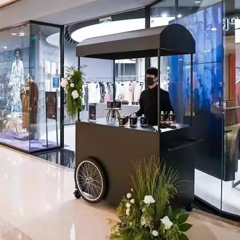 

Wrought iron float mobile stall trolley display stand
