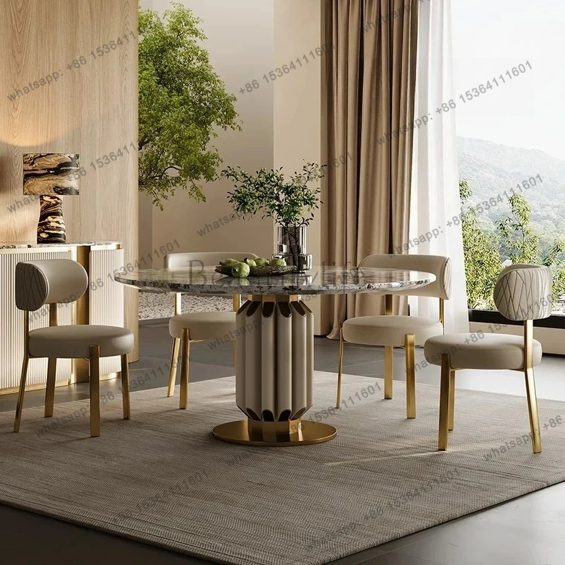 

Light luxury dining table and chairs table haute couture villa luxury house Italian marble luxury stone round dining table