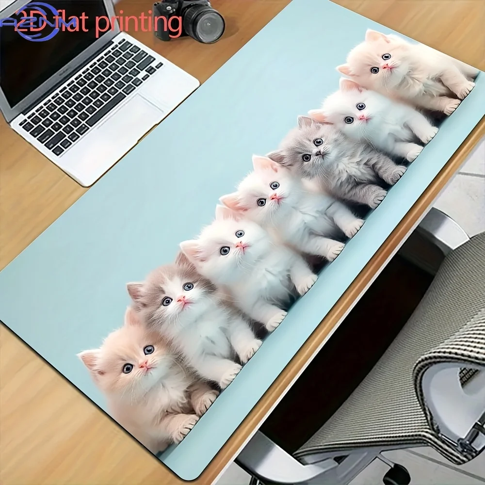 One Extra-Large Gaming Mouse Pad Featuring an Adorable Kitten Parade Design in White, Pink, And Gray on a Light Blue Background.