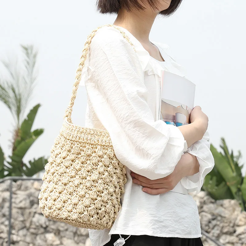 Koreanische Version Kordelzug Woven Schulter Handtasche Freizeit Urlaub Am Meer Strand Tasche Sommer Net Red Stroh Eimer Tasche Frauen