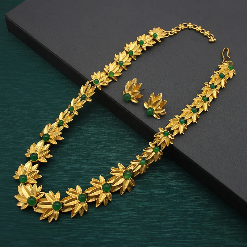

Used Necklace Set: Versatile Gold-plated Necklace with Glass, Stud Earrings, Petal, and Agate Bead Accents