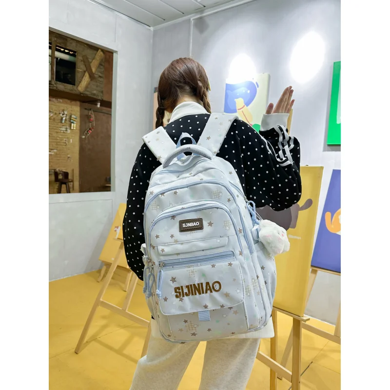Star-printed backpack for female junior high and high school students, multi-pocket, high aesthetic valueinsLarge-capacity campu