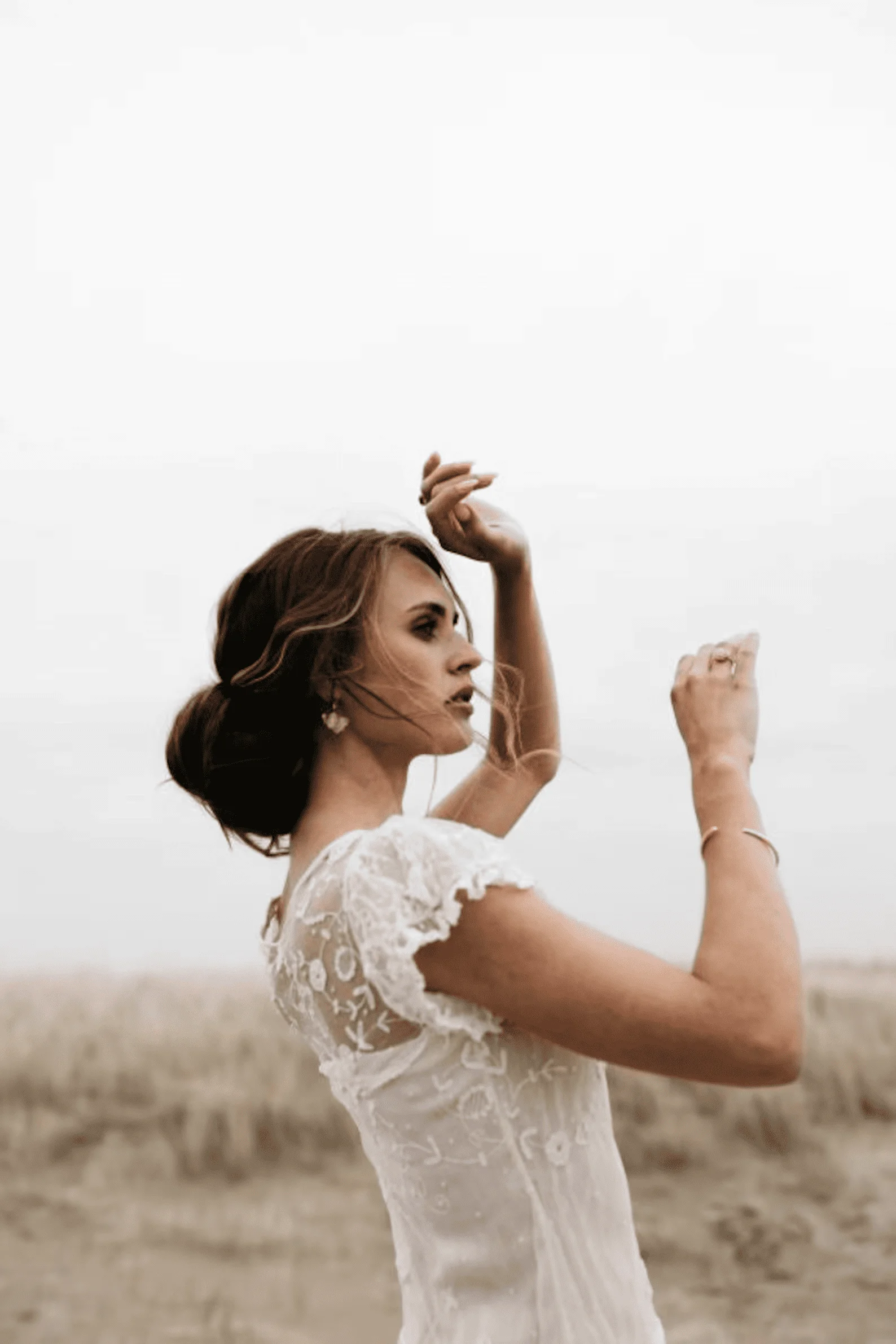 

Customize The Latest 2025 Bohemian Style Wedding Dress With White Lace Covered Sleeves Embroidered Details And Layered Skirt