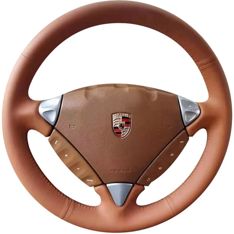 Pokrowiec na kierownicę samochodową Porsche Cayenne 2003-2010, szyty ręcznie, brązowa, naturalna skóra, odporny na zużycie, antypoślizgowy.
