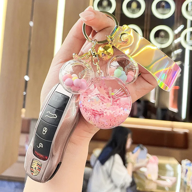 المعلقات سلسلة المفاتيح الراقية والرائعة من Miniso، وزجاجات المعلومات، والدمى السائلة، والحقائب، وهدايا قلادة سلسلة المفاتيح