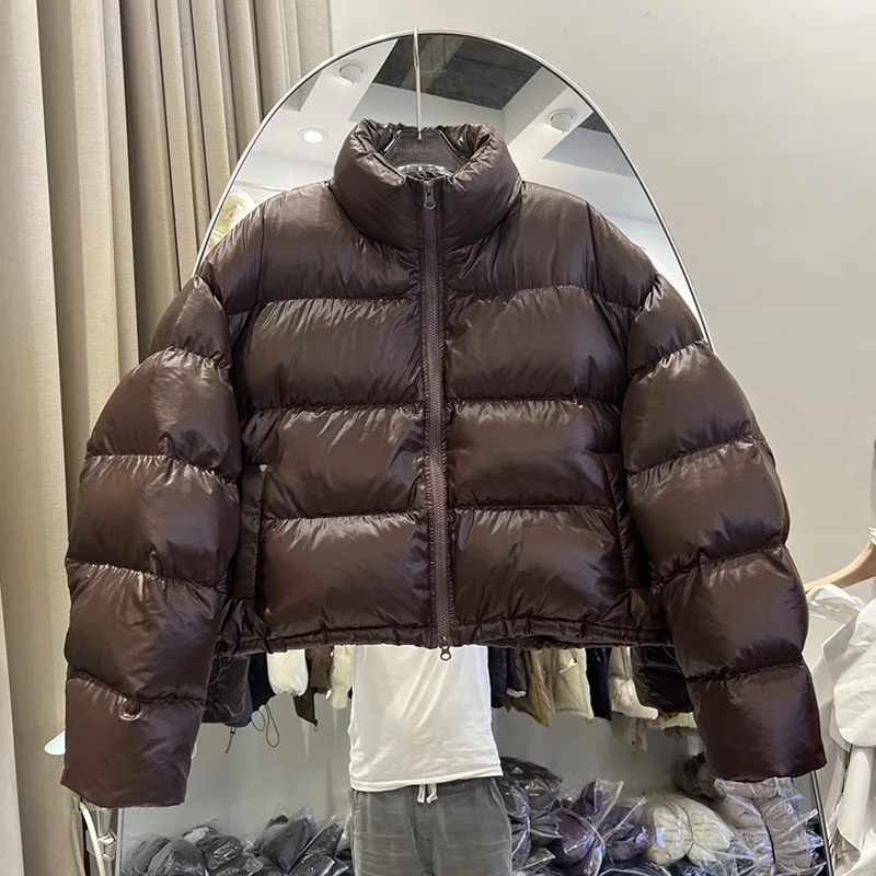 2025 hiver blanc canard vers le bas court femmes doudoune pardessus mode chaud col montant ample couleur unie femmes doudoune