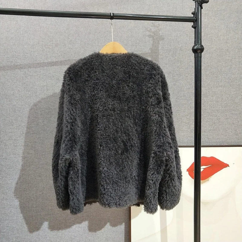 2025ฤดูหนาวใหม่มาถึงแกะShearling Fur-Trimmed Coatผู้หญิงBatwingแขนVคอเสื้อหนังเทียมJT514