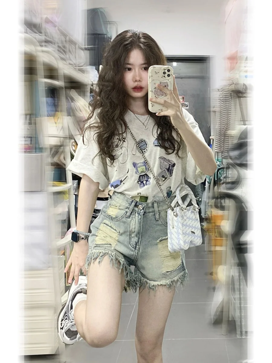 กางเกงยีนส์ขาสั้นเอวสูงแต่งพู่ขาดๆ สำหรับผู้หญิงไซส์ใหญ่ ทรงหลวม ขากว้าง ทรงเอ แฟชั่นฤดูร้อน สไตล์ลำลอง