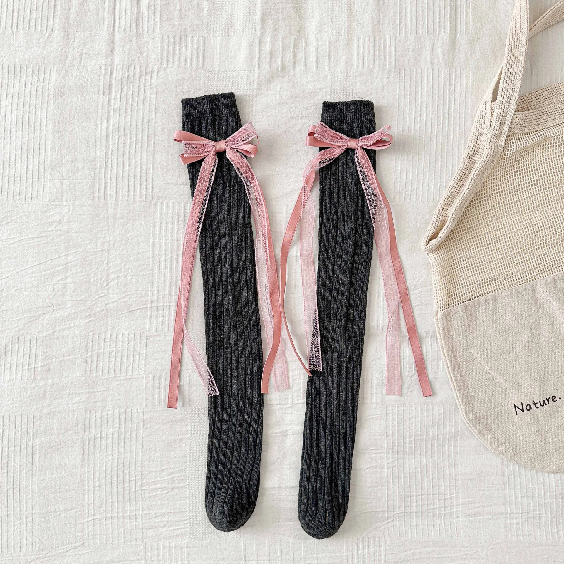 جوارب ربيع 2026 للأطفال البنات جوارب حلوة متوسطة الطول للفتيات جوارب طويلة بعقدة على شكل فيونكة على طراز القرآن جوارب للأطفال بشرابة #6