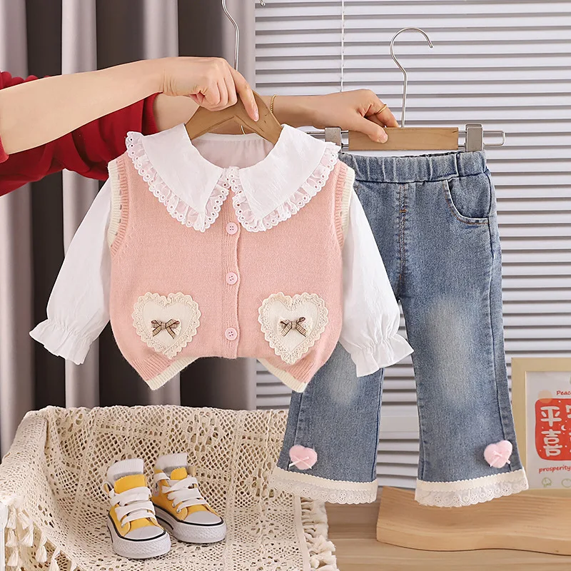 2026 Spring Baby Girl Clothes 3 Piece Set White Lace Ruffle Shirt + Heart Knit Vest + Bow Flare Jeans Kids Cute Princess Outfits