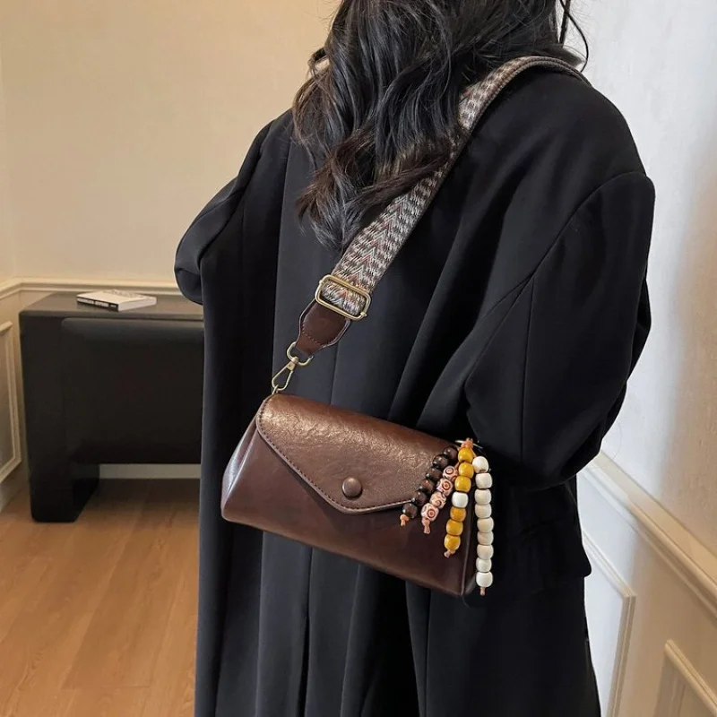 

Women's Tote Bag Elegant Leather Shoulder Strap Included Famous Designer Luxury Brand Spacious Interior