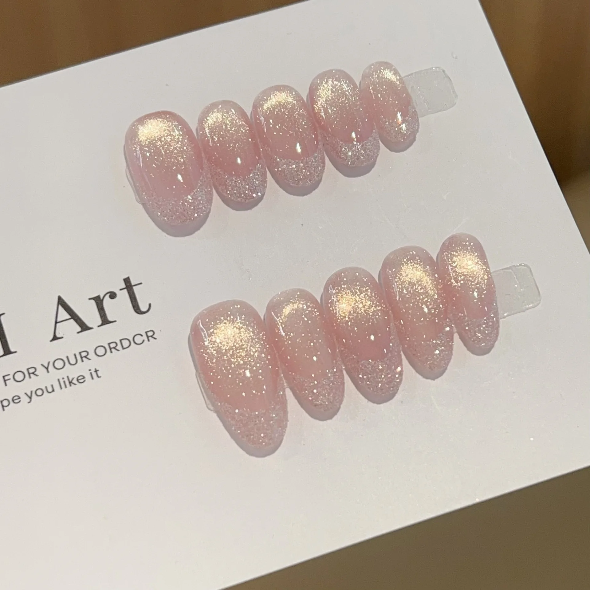 

10 шт. Накладные ногти ручной работы, средней овальной формы, розовые с блестками, французский маникюр, полное покрытие, блестящие, с эффектом кошачьего глаза, готовые к носке