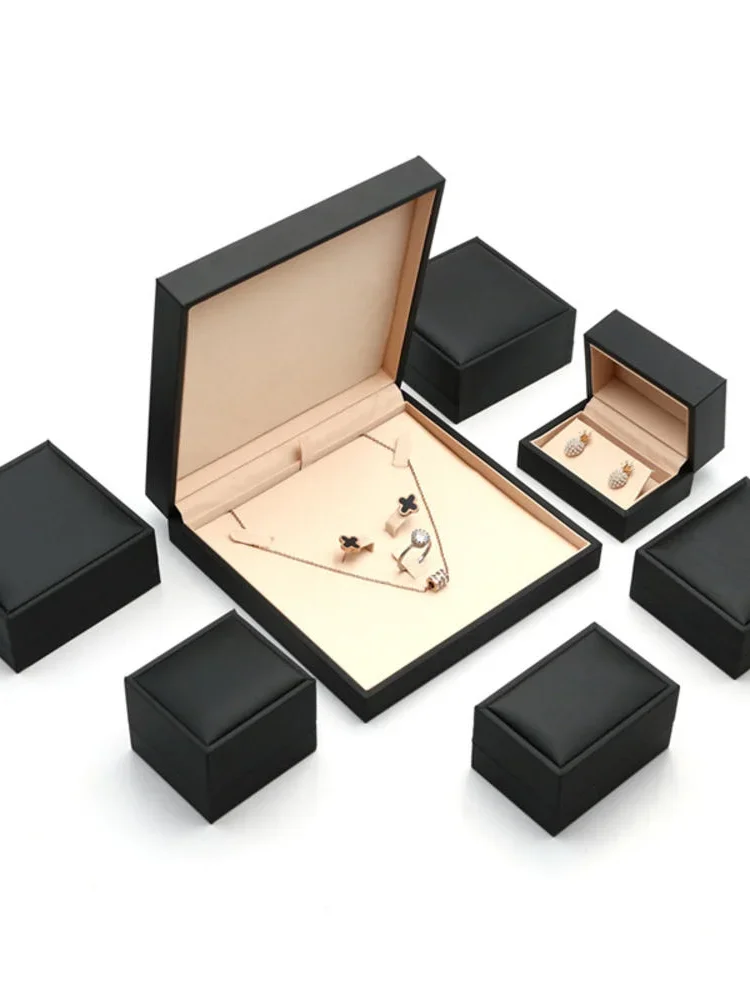 Boîte à bijoux en cuir brossé noir, boîte de rangement pour matiques, boucles d'oreilles, bracelet, étui d'affichage de collier, haute qualité