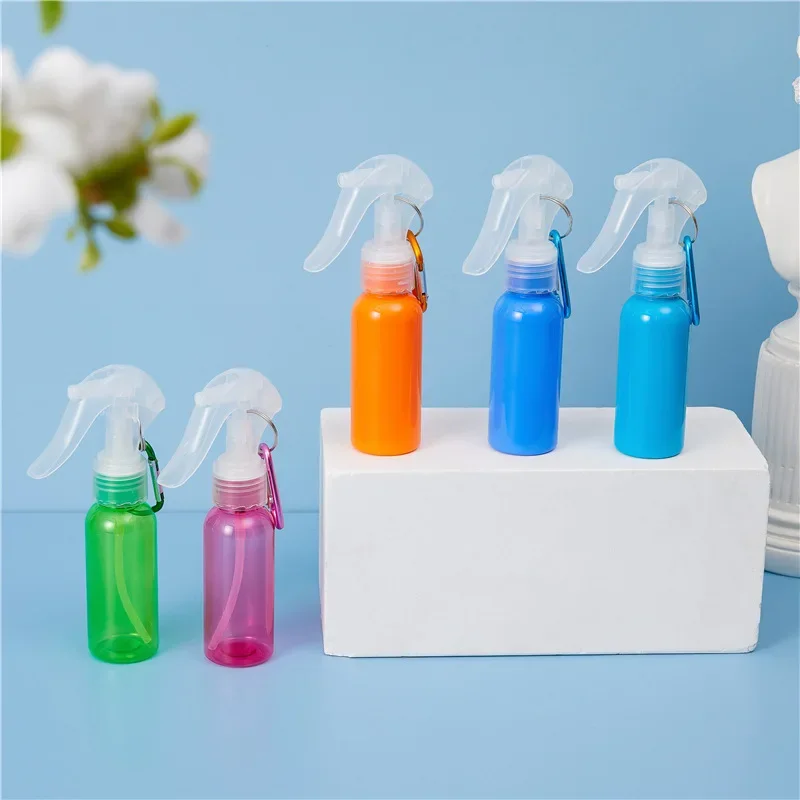 Botella de Spray de 60ml con gancho, atomizador de Perfume de plástico transparente recargable s, Mini accesorios de viaje vacíos
