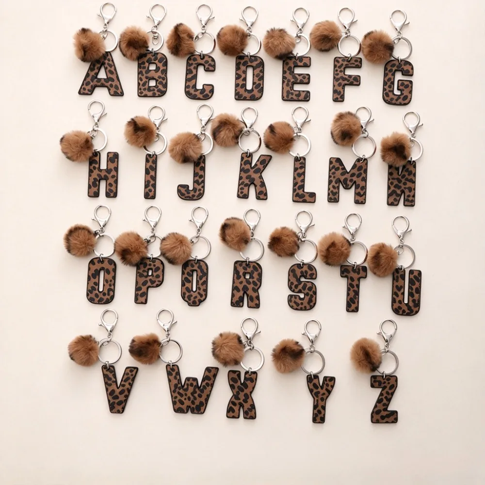 Cheetah Print Letter Keychain A-Z English Letter Tag Leather Acrylic Key Chain with Pom Pom Bag Charm Women Bag Accessories