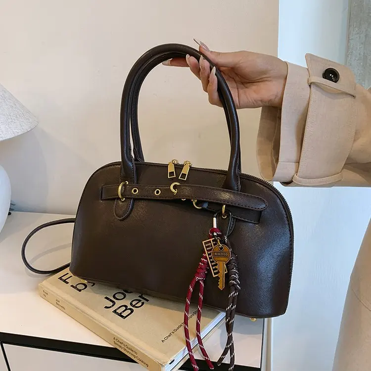 

Элитная нишевая женская сумка 2025 года, повседневная универсальная сумка через плечо, вместительная сумка-багет на плечо