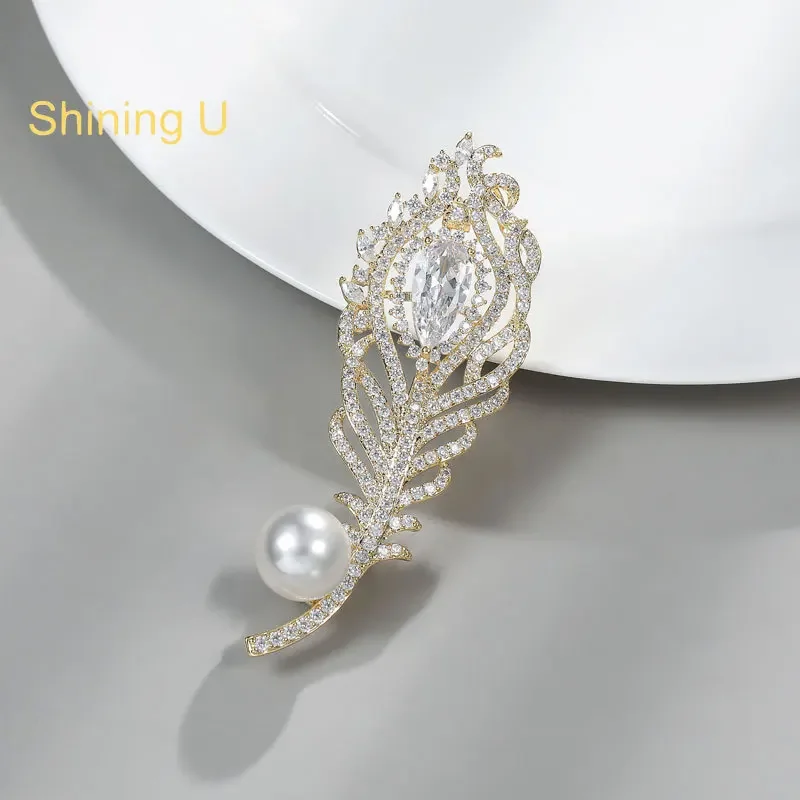 

Блестящая U-образная брошь с хрустальными перьями для женщин и мужчин, модный аксессуар, подарок на Новый год