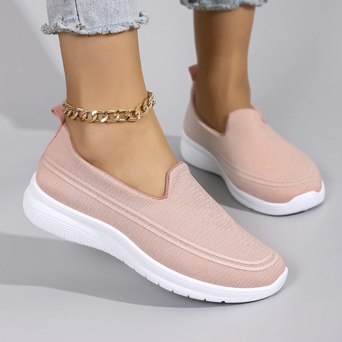 รองเท้าลําลองสตรีฤดูใบไม้ผลิที่สะดวกสบาย ระบายอากาศได้ น้ําหนักเบา และทนต่อการสึกหรอพร้อมพื้นรองเท้านุ่มสําหรับคนขี้เกียจในการเหยียบ