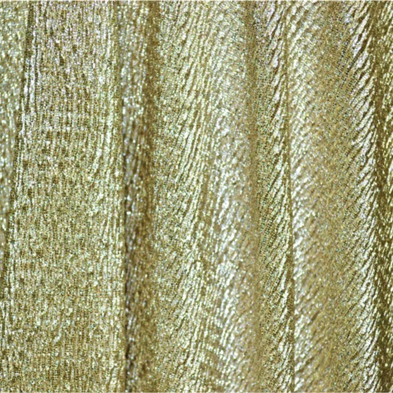 

A dress made of beige gold shiny three-dimensional wavy elastic fashion fabric as the base layer