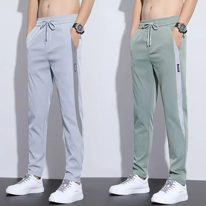 

Summer Thin Men Quick Dry Sweatpants Streetwear Fashion Elastic Waist Big Size New Tracksuit Male Joggers Sports Casual Trousers