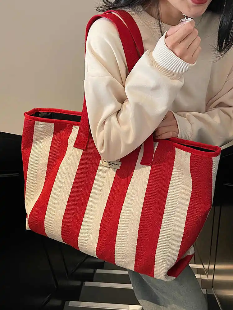

Large Capacity Women's Canvas Bag 2025 Autumn Winter New Versatile One Shoulder Pack Fashionable Striped Contrasting Tote Bags