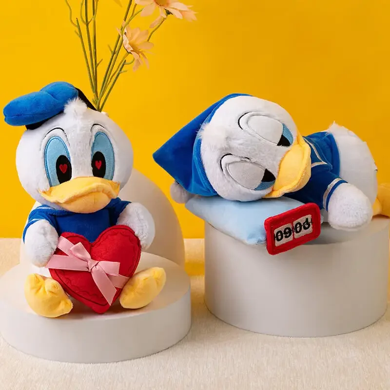 Disney Donald Duck Baumwollpuppe Junge und Mädchen Plüschtier Tägliche Aktivitätsserie Plüschpuppe Sofa Bett Dekoration Valentinstagsgeschenk