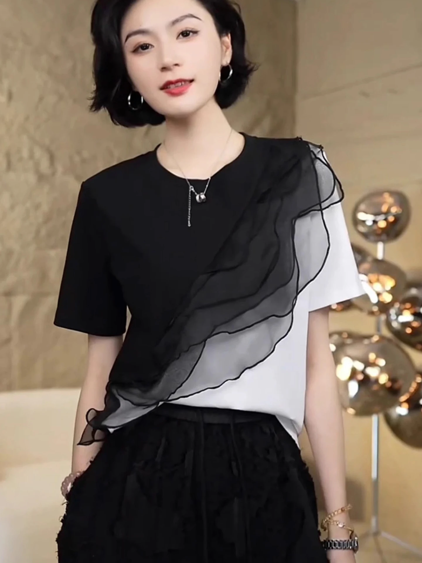 เสื้อยืดแฟชั่นผู้หญิงทรงหลวมสไตล์เกาหลีสำหรับฤดูร้อน