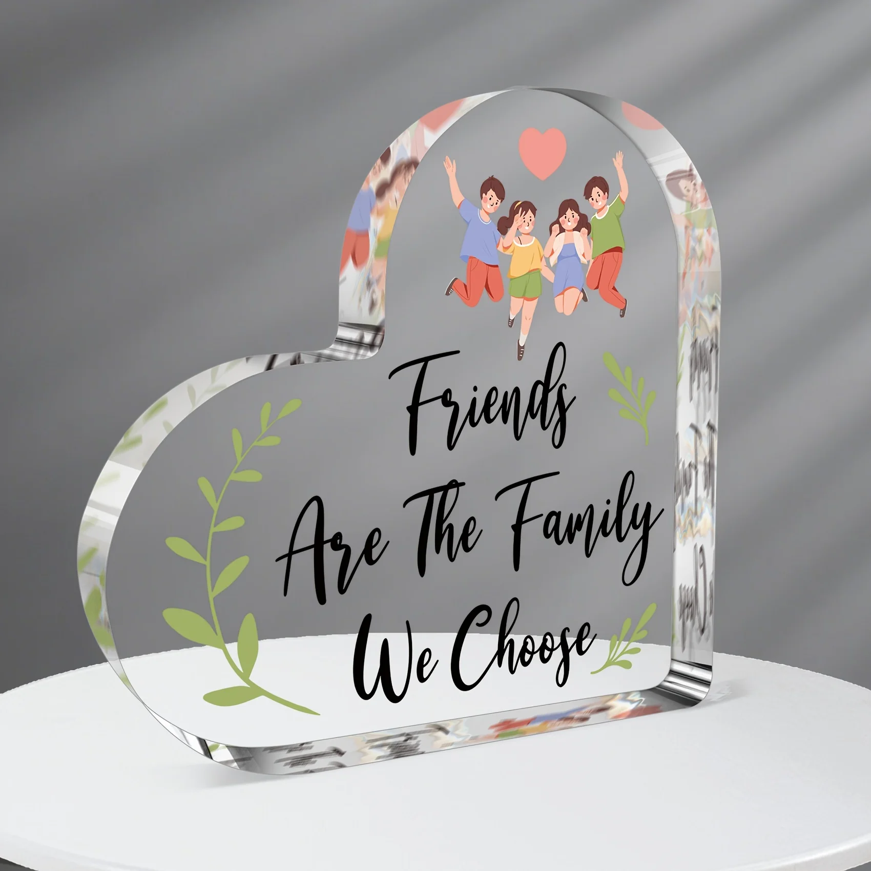Friends Are The Family We Choose Heart‑Shaped Acrylic Plaque Jumping Friends Cartoon Desk Decor Cartoon Cheerful Friends Heart Acrylic Stand, Green Leaf Accent Friendship Sentimental Keepsake Gift