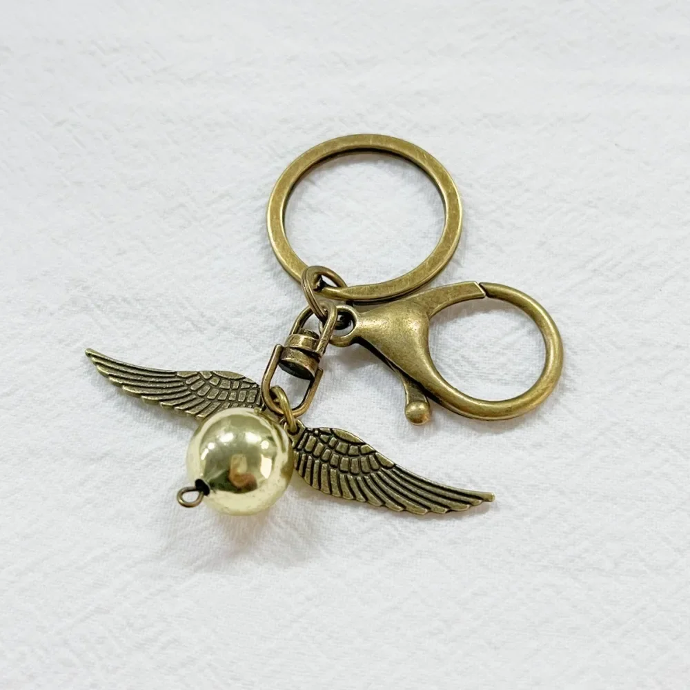 Retro Goldfarbener Schnitz-Schlüsselanhänger Hogwarts Magie-Akademie Harry Potter Die Heiligtümer des Todes Schlüsselring für Fans Geschenke Taschen-Schmuck – Detail 5