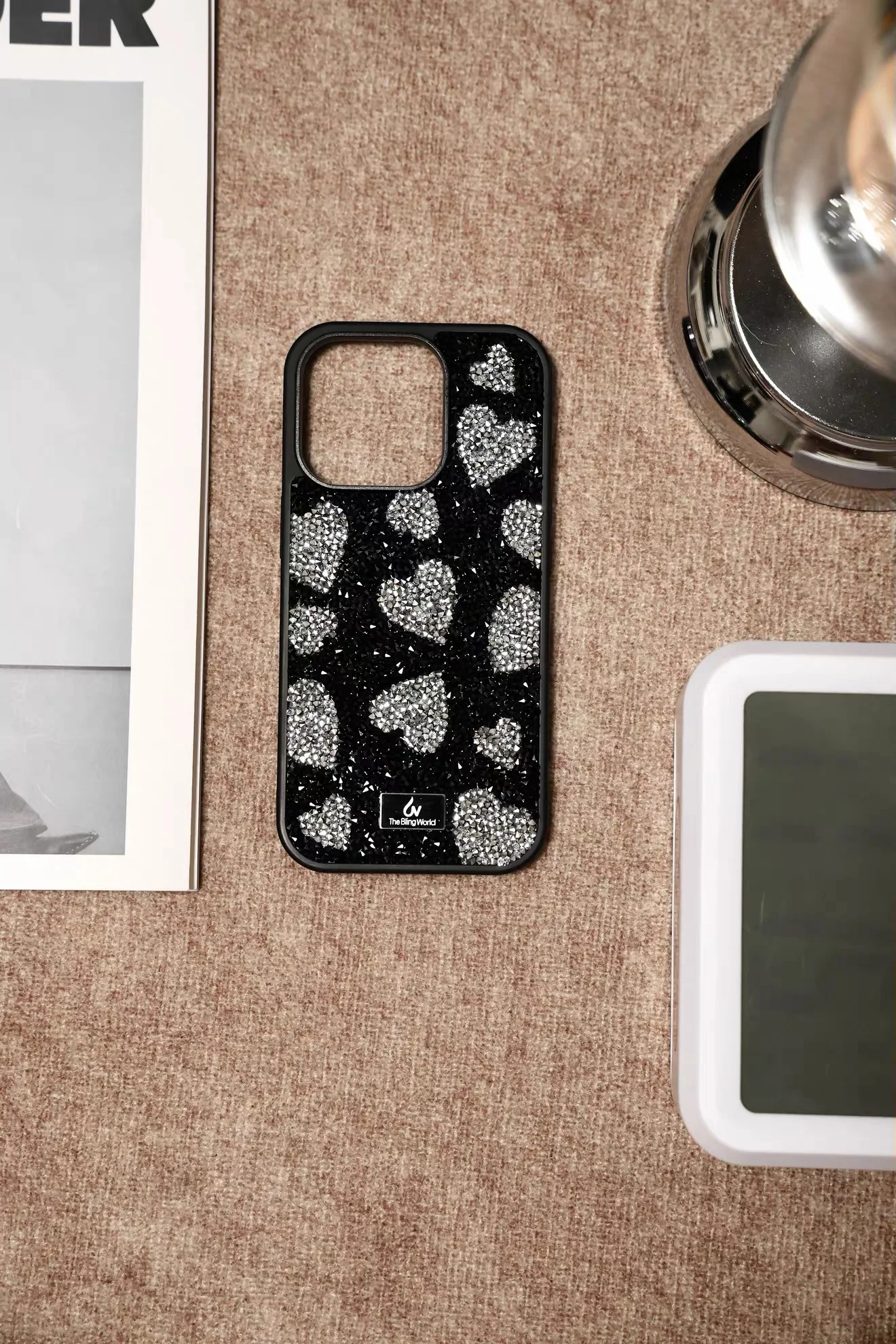 Luxury-lite water droplet-shaped black phone case with love hearts, suitable for iPhone, with full silicone coating