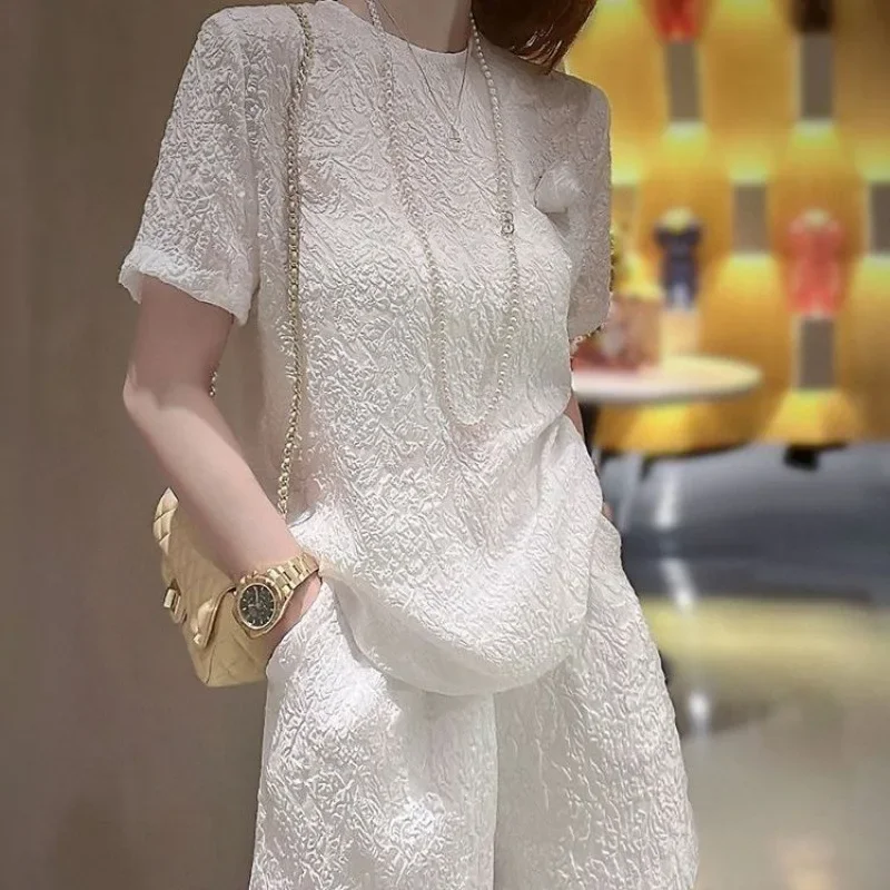 

Short-sleeved fashion suit women's summer 2024 new white high-quality mulberry silk casual western-style shorts two-piece suit.