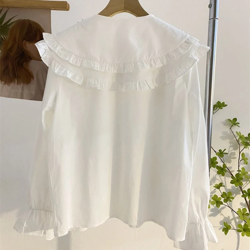 Double layered doll collar shirt, women's long sleeved sweet anti-aging nail bead fashionable and stylish versatile chic top